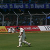 An upset Andrew Flintoff walks back