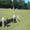 Glen Sulzberger and a team mate talk to a supporter