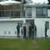 Central Districts players waiting for play to resume