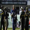 Andrew Flintoff leads the players off the field at the end