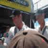 Mark Richardson and Shane Bond signing autographs