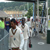 Daren Ganga and Rawl Lewis walk onto the field to play for their Test careers.