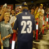 Shane Warne signing autographs